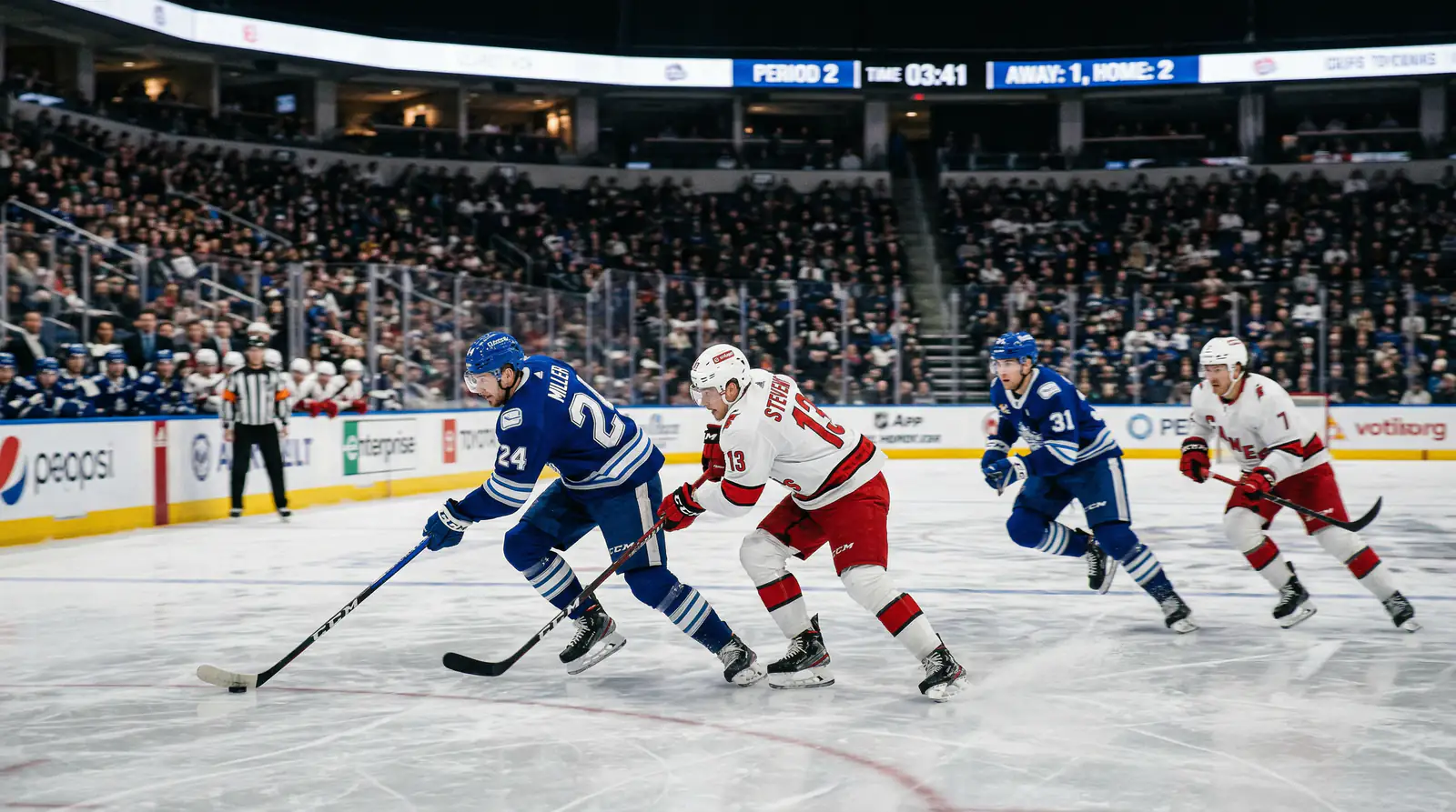 Spannendes Eishockeyspiel mit Spielern in Aktion auf dem beleuchteten Eis